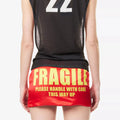 FRAGILE MINI SKIRT