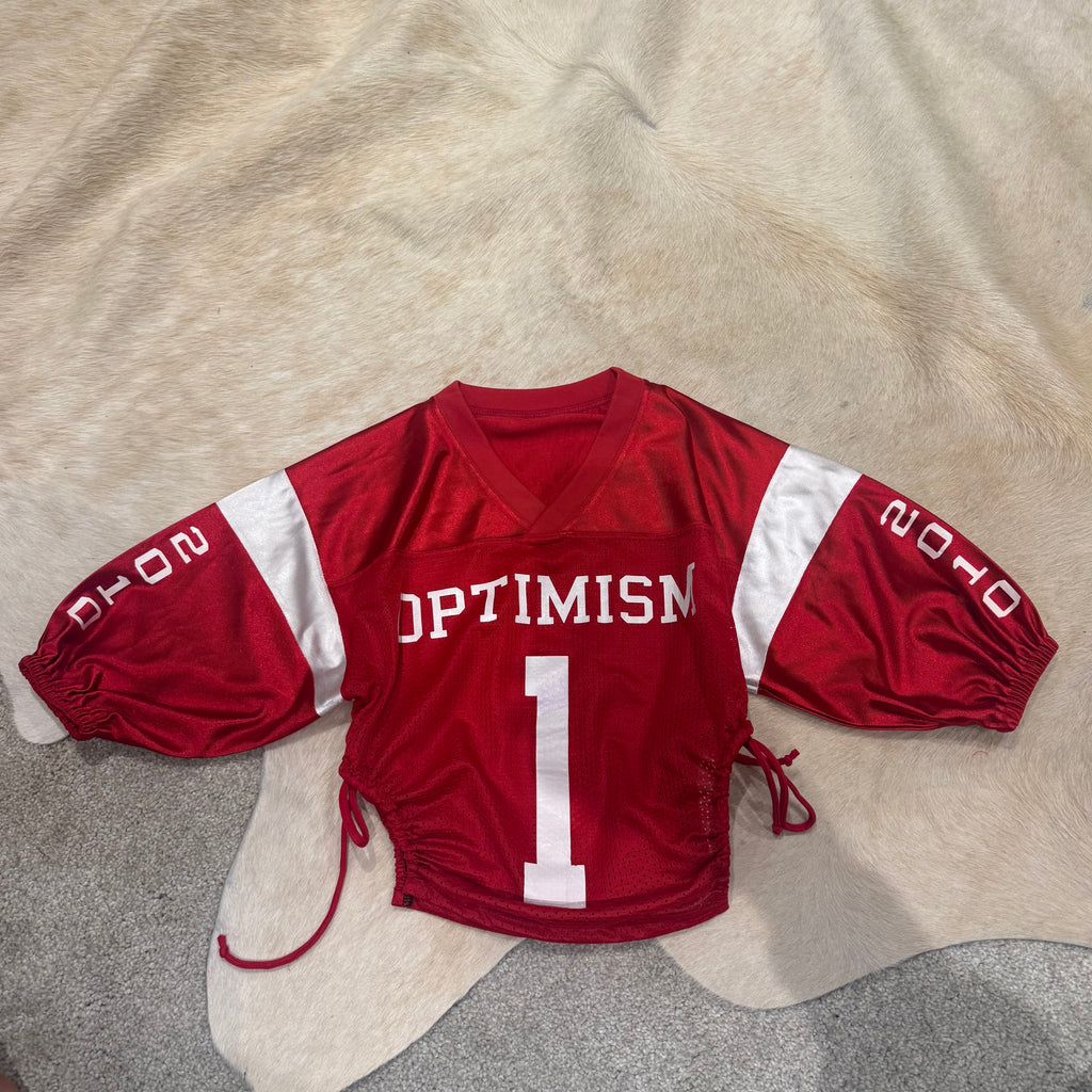 OPTIMISM VARSITY CROP