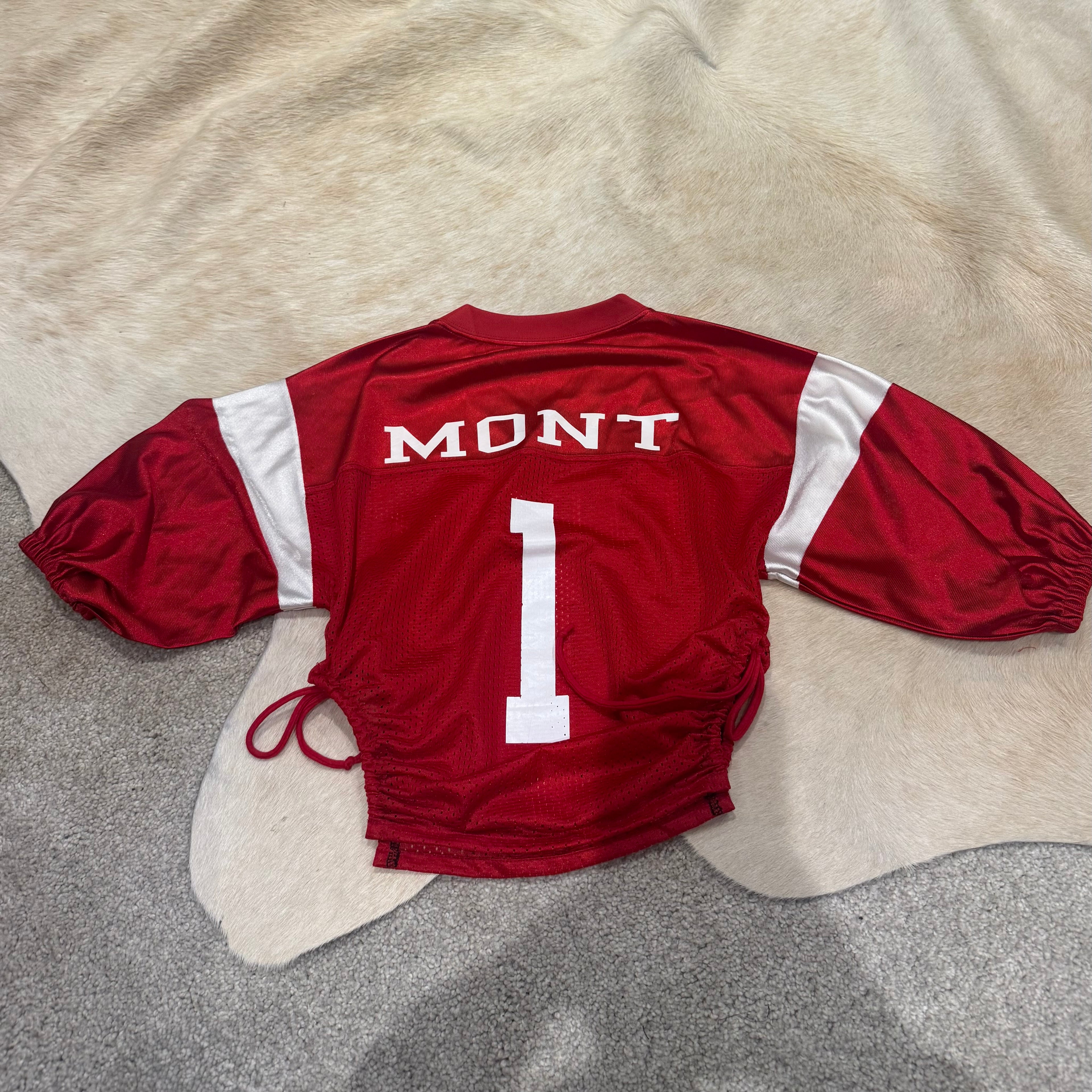 OPTIMISM VARSITY CROP